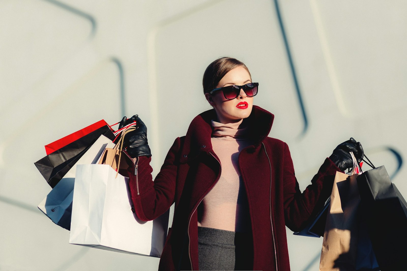 Fashion shopper comparing clothing sizes before checkout