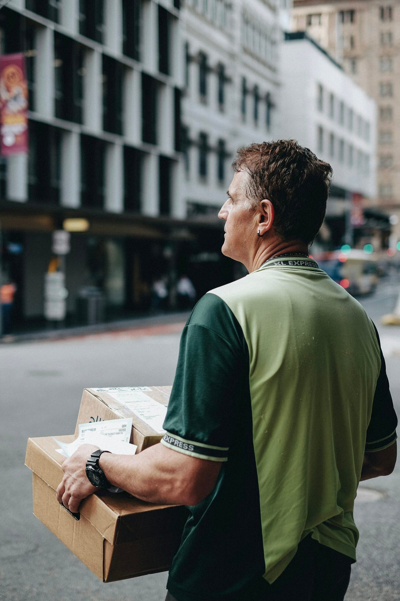 Cardboard delivery boxes being carried during a home move