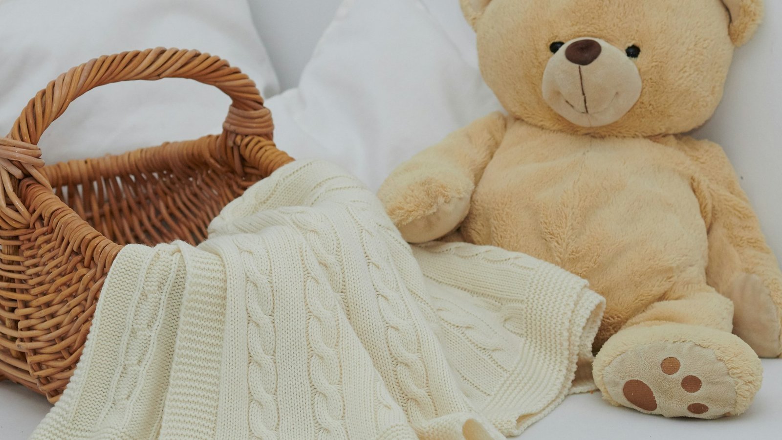 Plush bear representing safe use of a warming toy