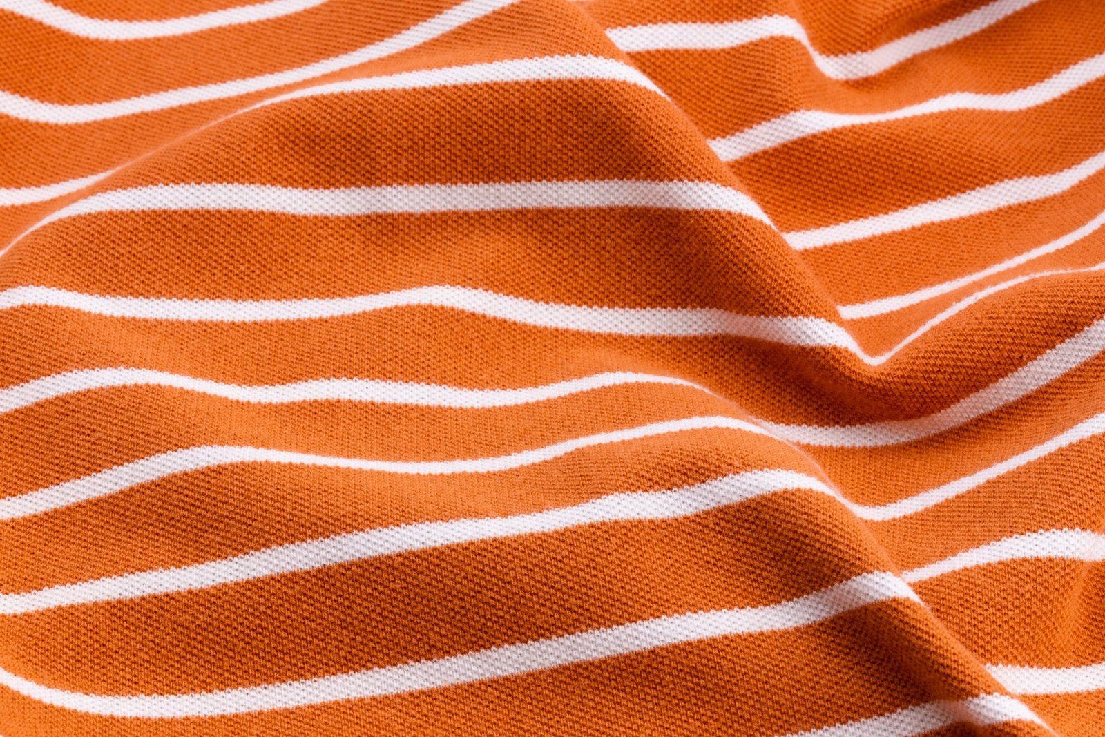 Orange striped fabric for a pajama-material guide