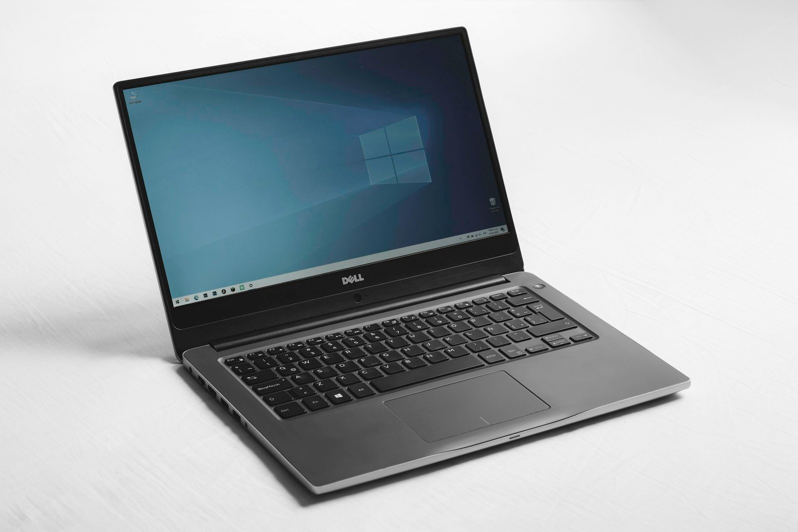 Laptop on a desk representing an electronics warranty decision